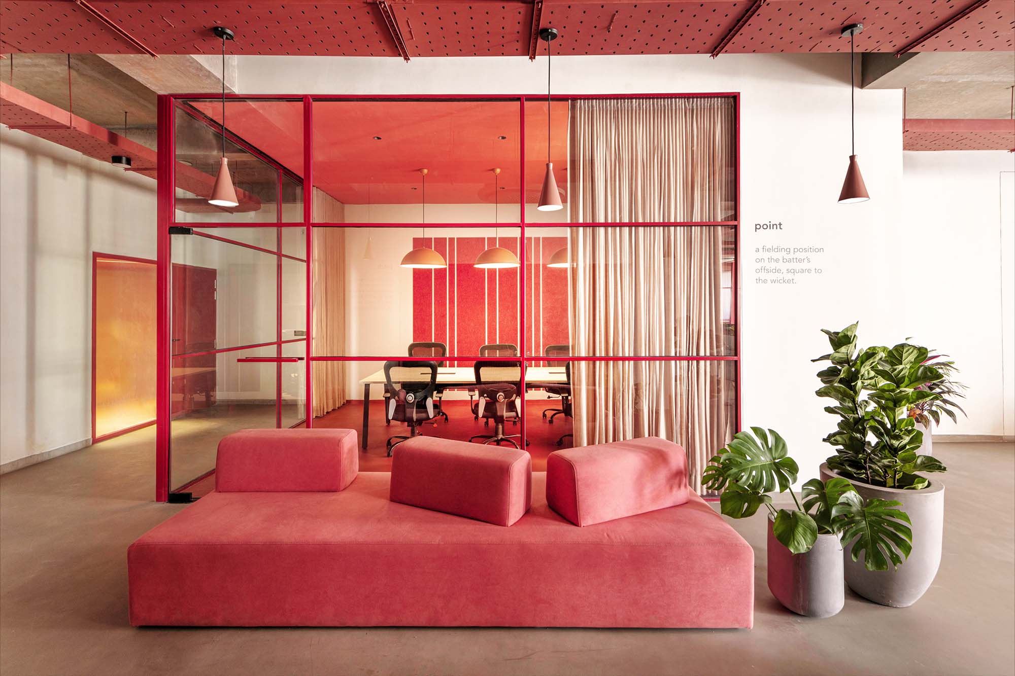 Vibrant red accents define the dynamic interiors of CH Office